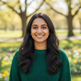 smiley girl on a green sweater